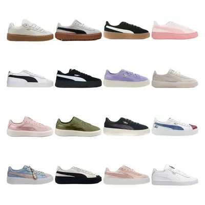 Twelve low-top suede sneakers in white, pink, lilac, olive and black, arranged in four rows